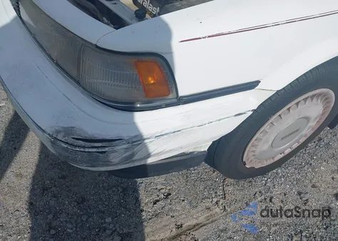 1989 Toyota Camry Le z USA, uszkodzony, nr VIN JT2VV22E3K0080031